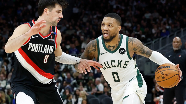 דמיאן לילארד לצד דני אבדיה (צילום: GettyImages)