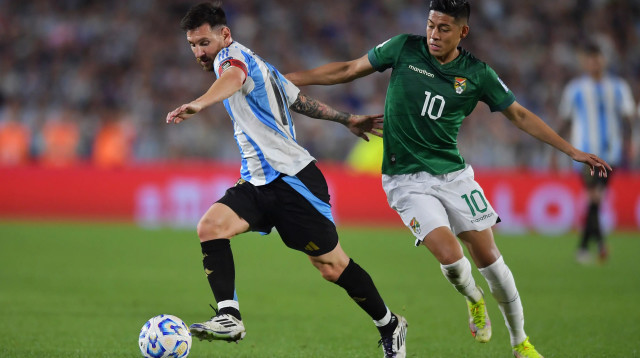 ראמירו ואקה שחקן נבחרת בוליביה מול ליאונל מסי שחקן נבחרת ארגנטינה (צילום: GettyImages, Marcelo Endelli)