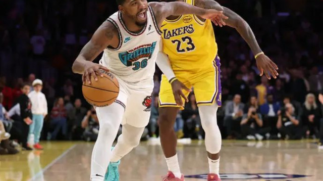 התחרו זה מול זה לא מעט לאורך הקריירה, וכעת הם ביחד. סמארט ולברון (צילום: GettyImages, Harry How)