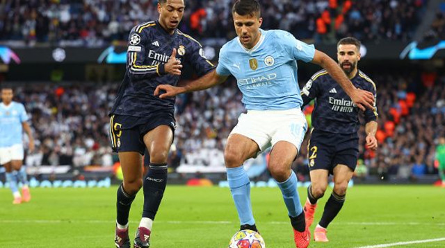 רודרי מול ג'וד בלינגהאם של ריאל מדריד (צילום: Chris Brunskill/Fantasista)