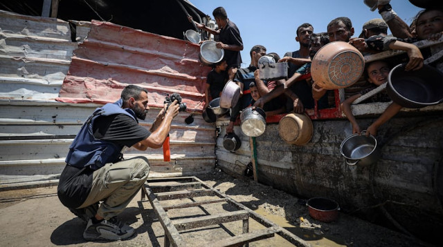 הצלם העזתי, אנאס זאיד פטייחא (צילום: Anadolu Agency)