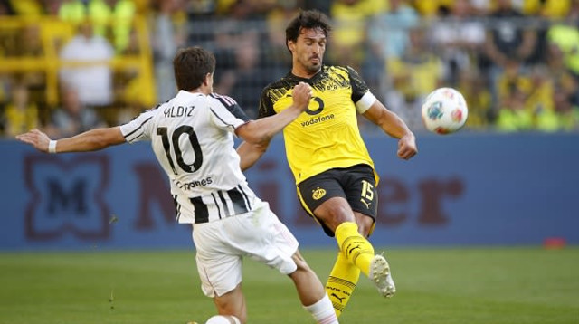 מאטס הומלס (דורטמונד) מול קנאן ייליז (יובנטוס) (צילום: Gettyimages)