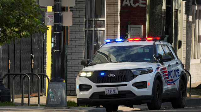 ניידת משטרה בוושינגטון הבירה (צילום: רויטרס)