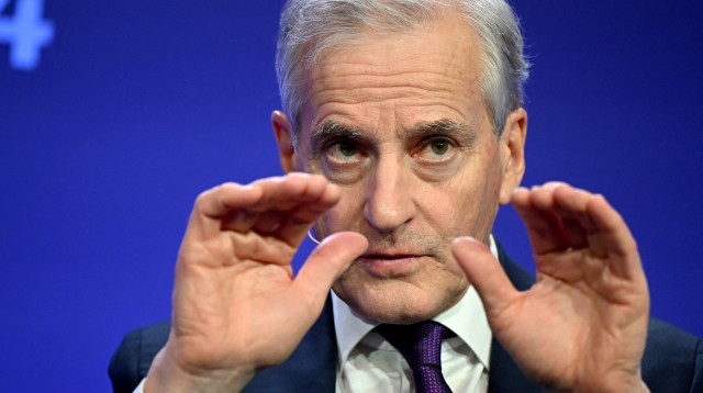 ראש ממשלת נורווגיה יונס גר סטרה (צילום: Leon Neal/Pool via REUTERS)