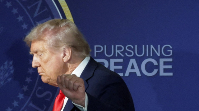 דונלד טראמפ בפגישה עם ולדימיר פוטין באלסקה (צילום: REUTERS/Jeenah Moon)