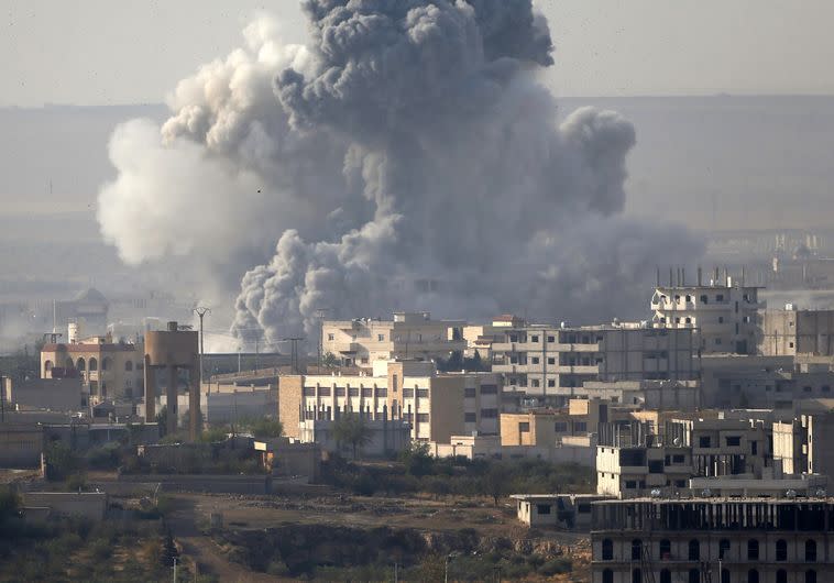 הפצצות בעיר קובאני בסוריה, צילום: רויטרס