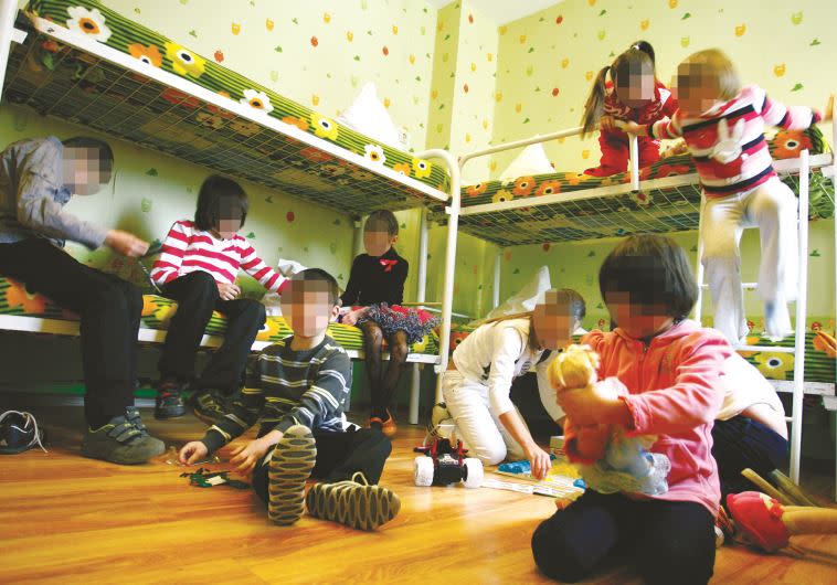 ילדים בבית אומנה. צילום ארכיון: רויטרס