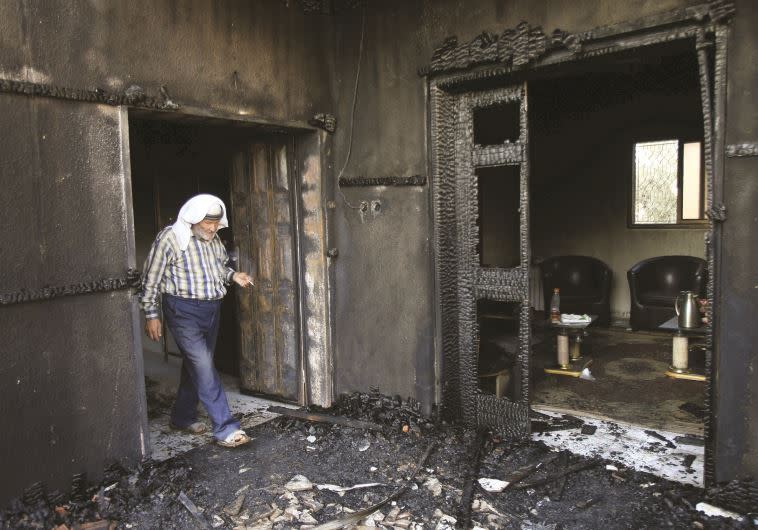 בית משפחת דוואבשה לאחר ההצתה. צילום ארכיון:רויטרס