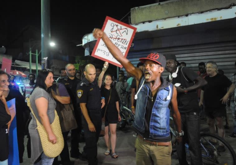 עימותים בין מסתננים למפגינים בת"א. צילום ארכיון: אבשלום ששוני