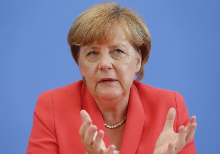 קולות גינוי מצד מרקל. צילום: רויטרס