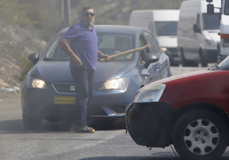 אברהם חסנו ז&quot;ל לפני פיגוע הדריסה. צילום: רויטרס