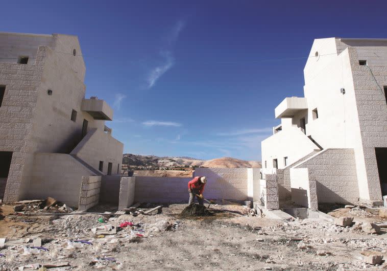 הפרה בוטה של הכללים או פשע מלחמה? הבנייה בהתנחלויות. צילום: רויטרס