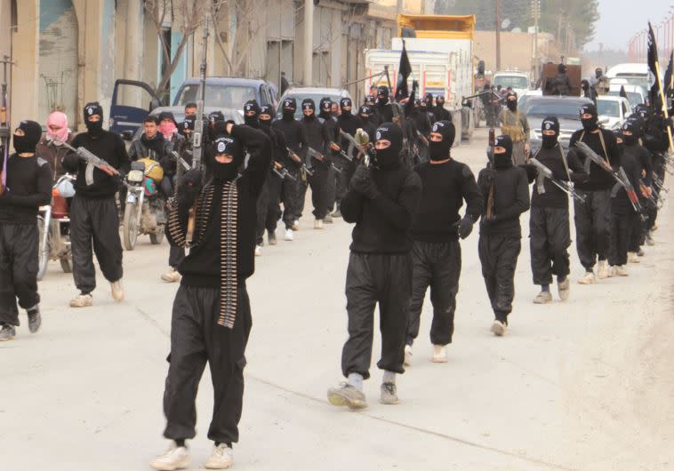 לוחמי דאעש בסוריה. צילום: רויטרס