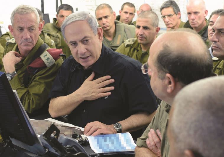 נתניהו, יעלון וגנץ במהלך צוק איתן. צילום: קובי גדעון, לע''מ