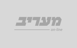 שחקני הפועל תל אביב מחבקים את כובש השער הישאם לאיוס (צילום: דני מרון)