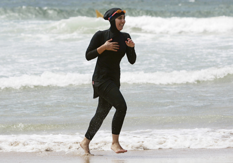 "אין מקום בגרמניה". אישה מוסלמית לובשת "בורקיני", צילום: רויטרס