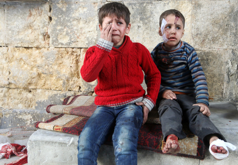 ילדים פצועים בבית חולים שדה בחלב, סוריה. צילום: רויטרס