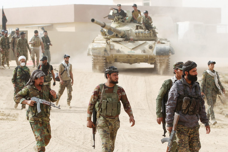 מיליציות שיעיות במוסול. צילום: AFP  