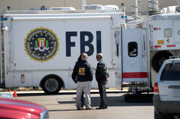 צוות FBI שחקר את האירוע. צילום: AFP
