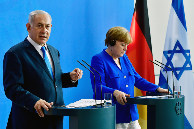 מרקל ונתניהו הערב בברלין. צילום: AFP