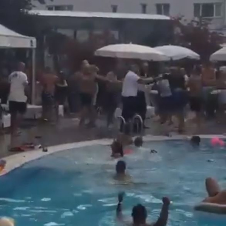 קטטה בין ישראלים בבוקרשט. צילום: מסך