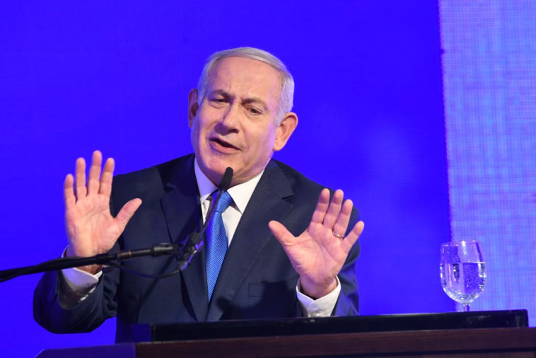 ראש הממשלה בנימין נתניהו נואם בעצרת הליכוד. &quot;לא מזדהה עם כל אמירה ואמירה&quot;. צילום: אבשלום ששוני