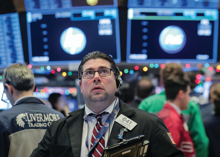 סוחר בבורסה בארה&quot;ב. תפקיד שהולך ונעלם. צילום: רויטרס