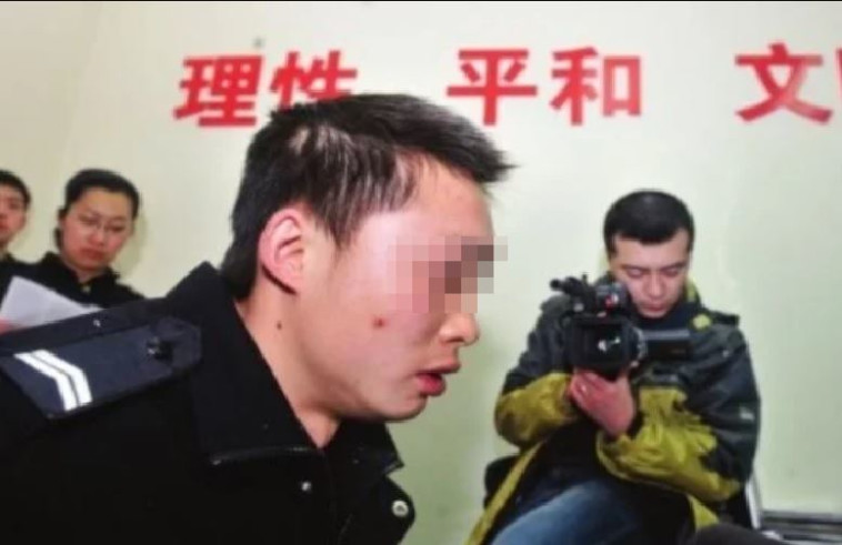 וואנג פאנג לאחר מעצרו. צילום מסך