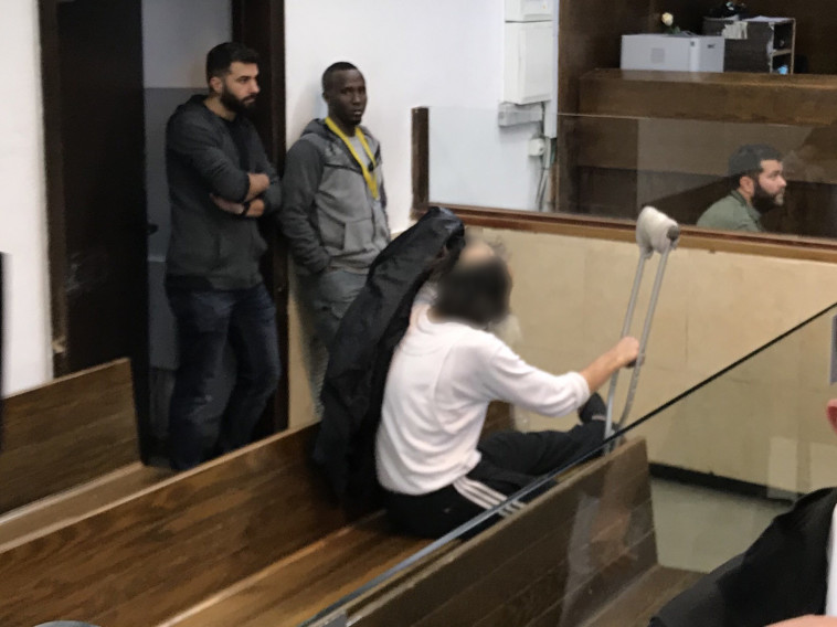 החשוד בבית המשפט. צילום: אבשלום ששוני