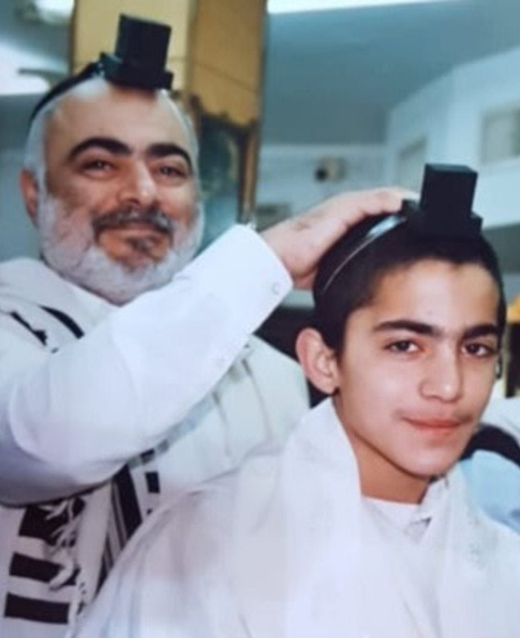 חיים אלמליח ז&quot;ל ובנו רפאל. צילום: דוברות המשטרה