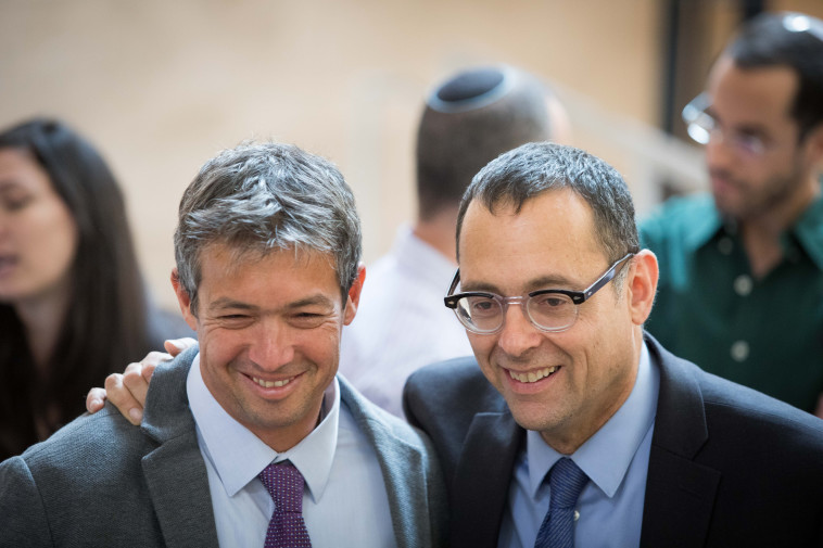 צבי האוזר ויועז הנדל