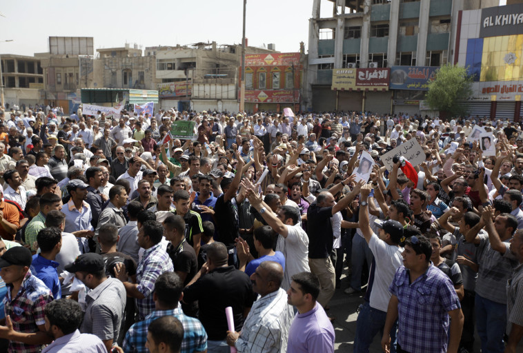 הפגנות המחאה בבגדד (צילום: Reuters/Saad Shalash)