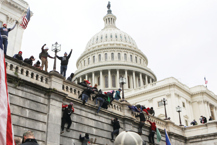 Breaking into Capitol Hill (Photo: Reuters)