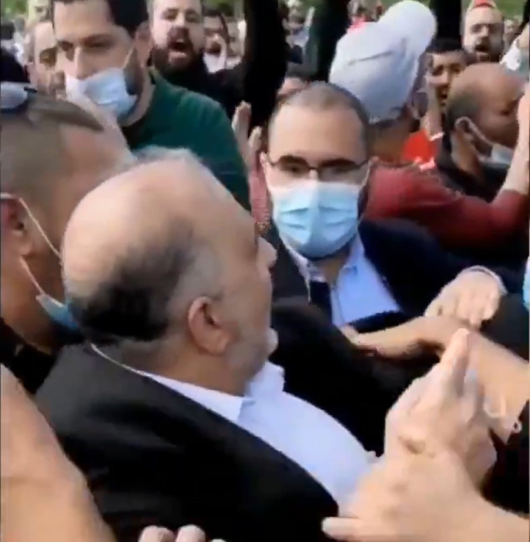 MK Mansour Abbas attacked during demonstration in Umm al-Fahm (Photo: Twitter screenshot)