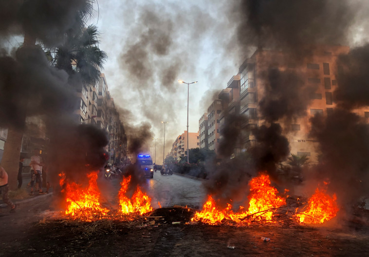 עימותים בלבנון (צילום: REUTERS/Issam Abdallah)