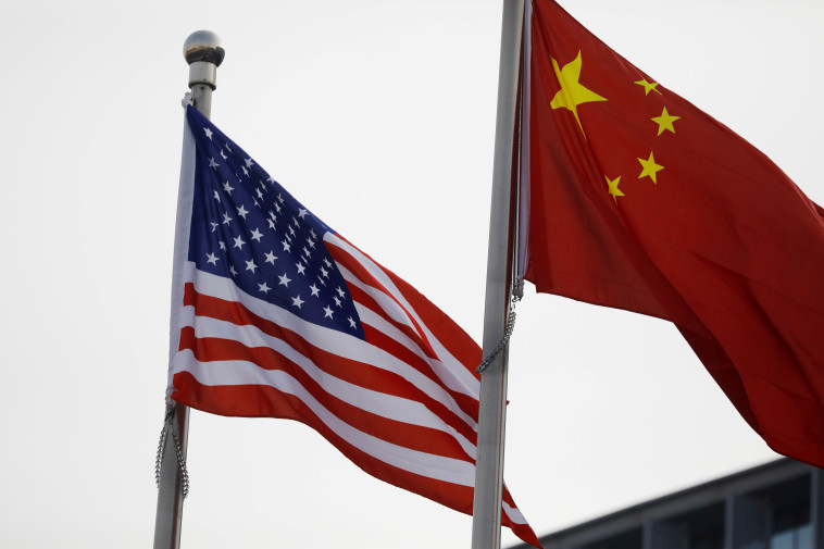 דגלי ארה''ב וסין (צילום: רויטרס)