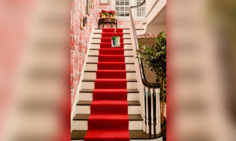 Paint cans dangle over the stairs (Photo: Reuters)