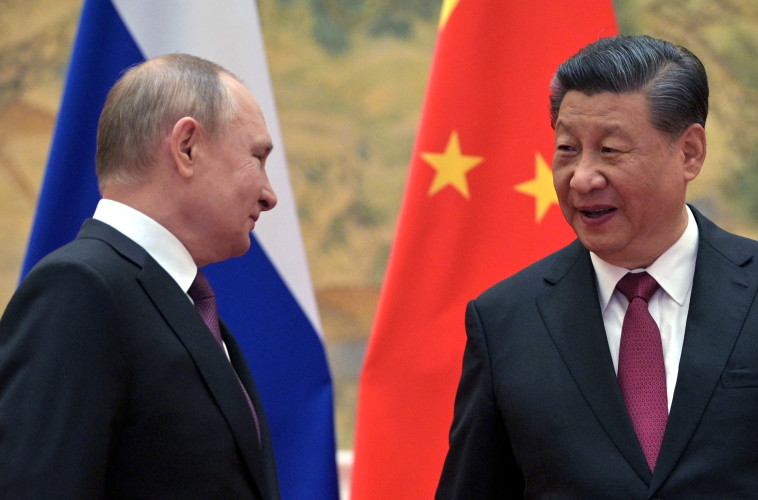 פוטין וג'ינפינג בפגישתם בסין (צילום: רויטרס)