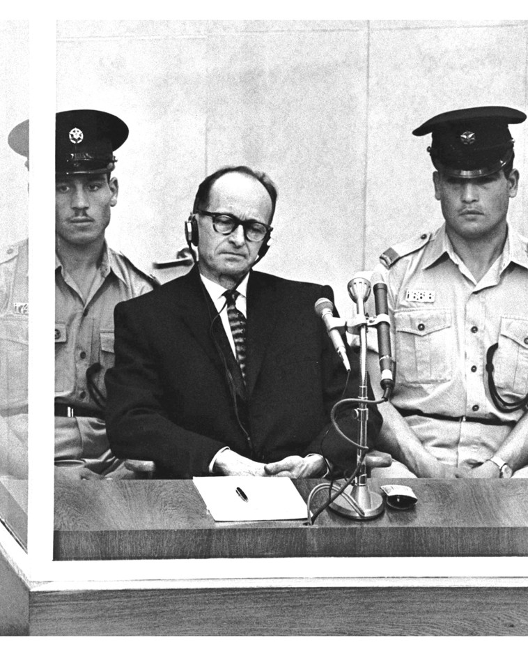 אדולף אייכמן במשפטו  (צילום: רויטרס)