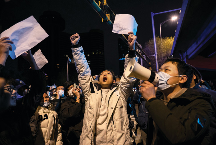 הפגנות הקורונה בסין (צילום: Kevin Frayer.GettyImages)