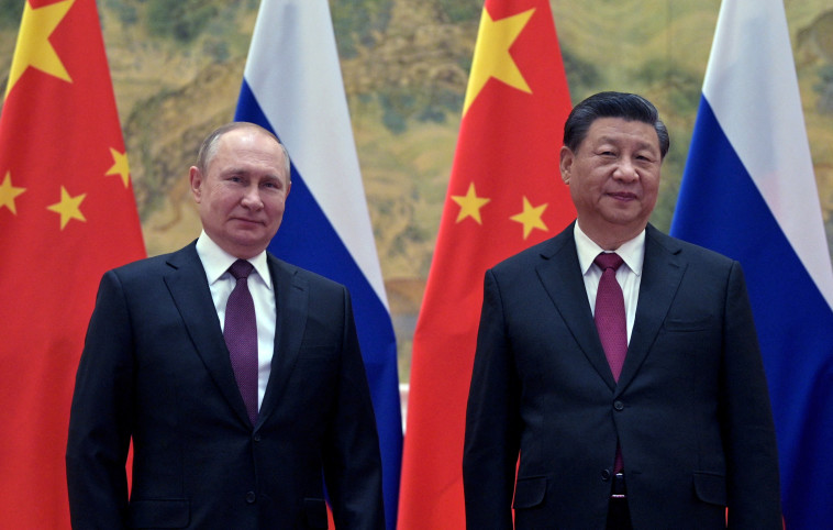 נשיא סין יחד עם ולדימיר פוטין (צילום: Sputnik/Aleksey Druzhinin/Kremlin via REUTERS)
