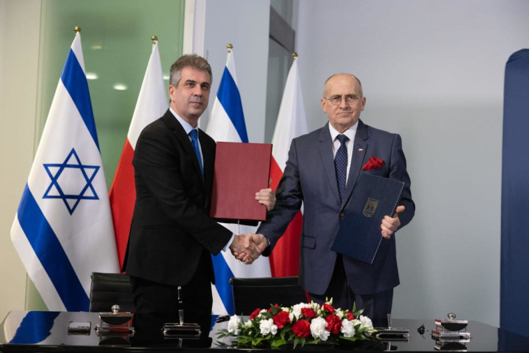 שר החוץ אלי כהן ושר החוץ הפולני זביגנייב ראו (צילום: שגרירות ישראל בפולין)