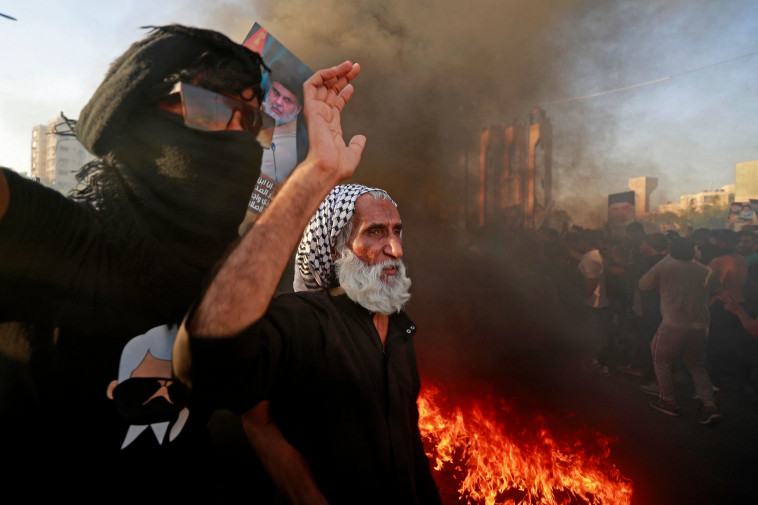 בעיראק זועמים על שריפת הקוראן בשוודיה (צילום: AFP via Getty Images)
