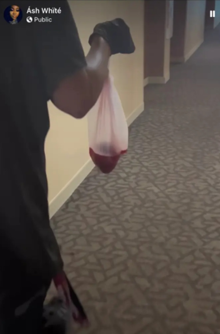 תיעדה את עובדת המלון אוחזת בשקית החשודה