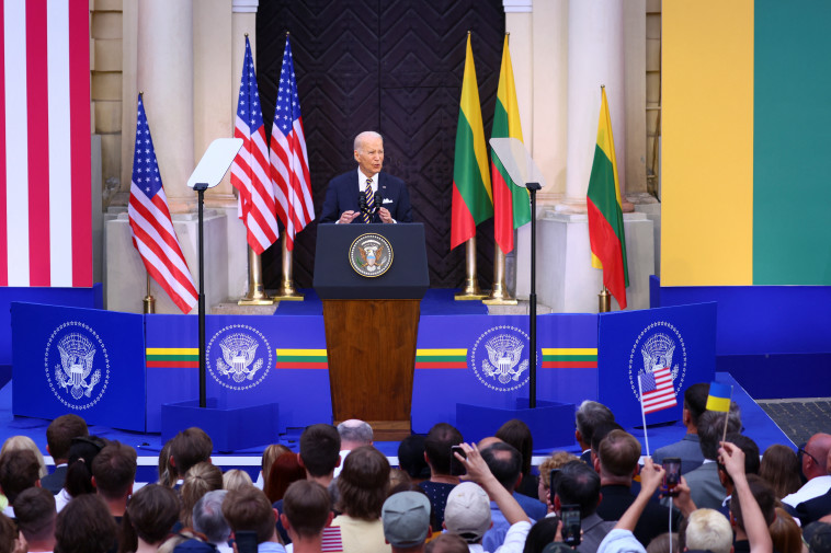 הנשיא ביידן בוועידת נאט''ו בליטא (צילום: REUTERS/Yves Herman)