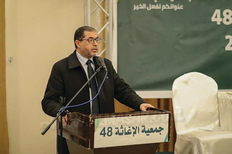 בכיר חמאס, באסם נעים בכנס עמותת סיוע 48 (צילום: אתר אלמסאר)