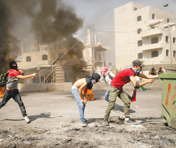 עימותים בין פלסטינים לכוחות הביטחון. צילום: רויטרס