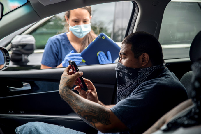 בדיקות קורונה באוסטין, טקסס. צילום: Sergio Flores/רויטרס